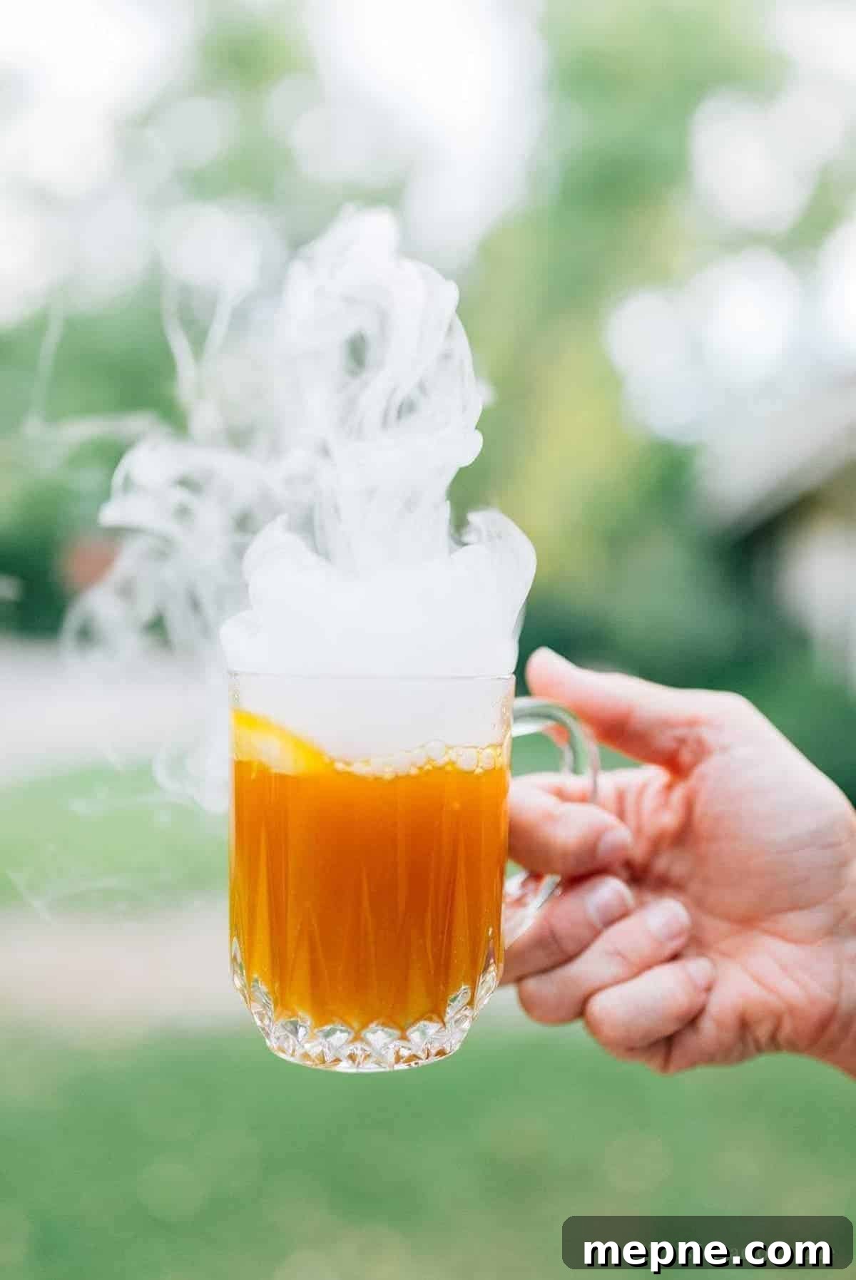 Smoking halloween drink in a mug.