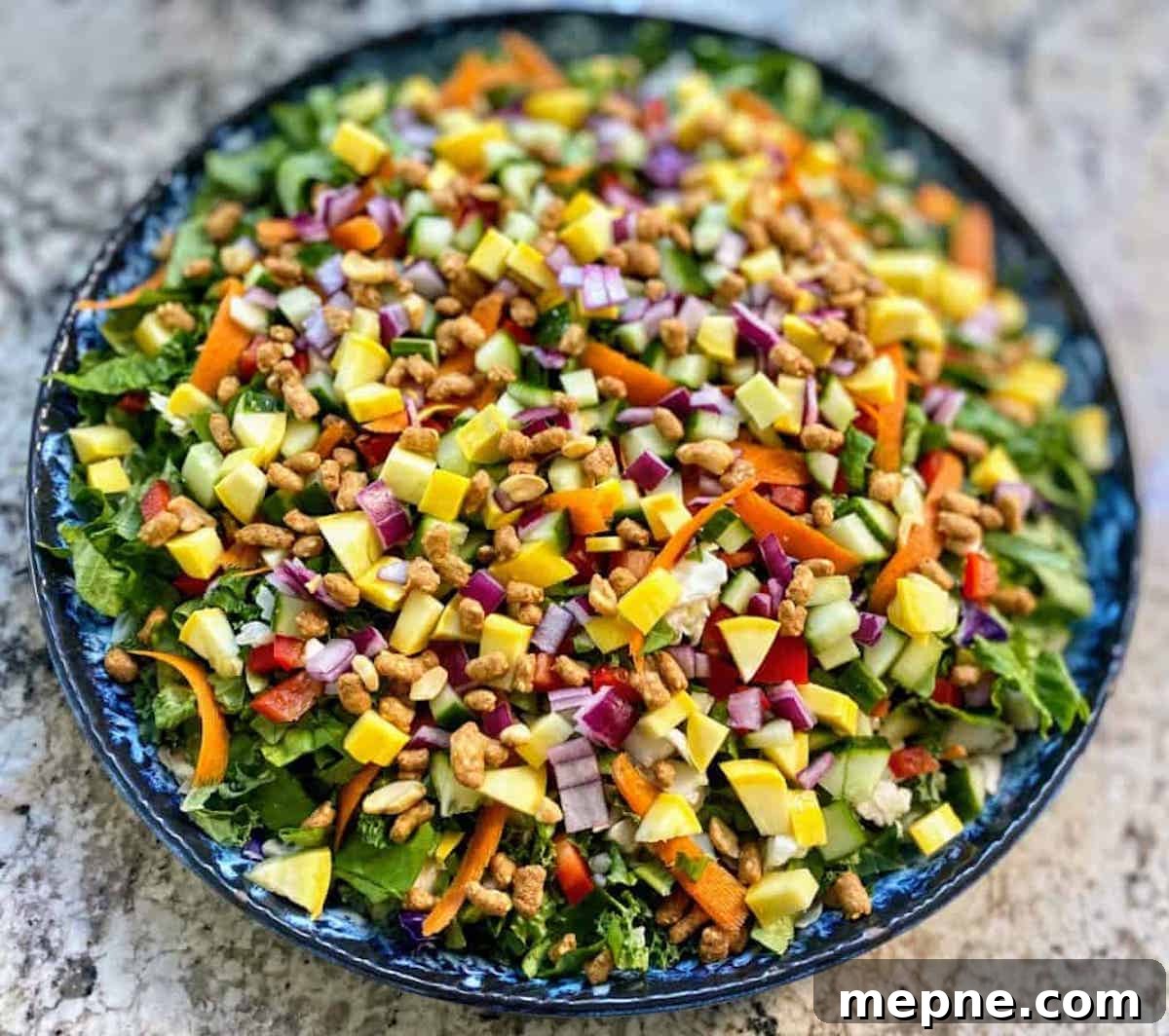 Asian Chopped Salad Recipe with Sesame Ginger Dressing 4 Asian chopped salad recipe on a platter on the table.