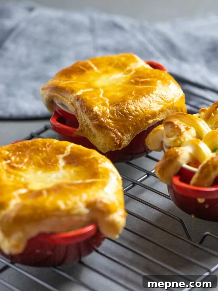 Chicken Pot Pie with Flaky Puff Pastry Crust 2 easy chicken pot pie with puff pastry in red ramekins