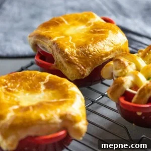 easy chicken pot pie with puff pastry in red ramekins