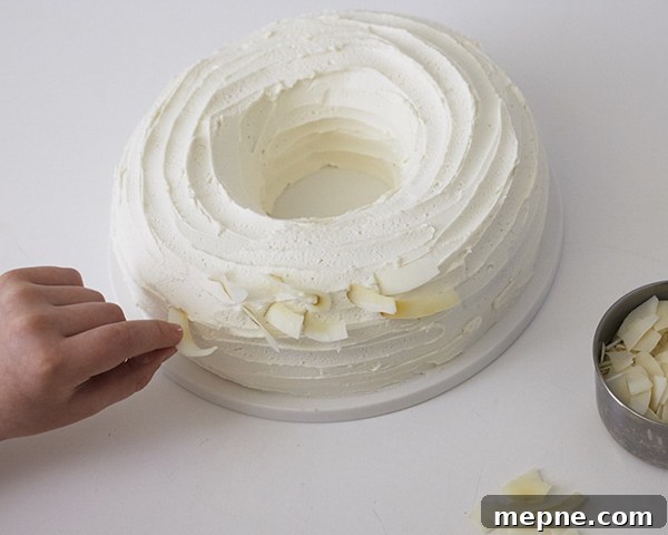 Chocolate Easter Nest Cake Recipe 14 Easter Nest Cake - how to make a nest cake with roasted coconut and chocolate eggs for Easter dessert | by Cakegirls for TheCakeBlog.com