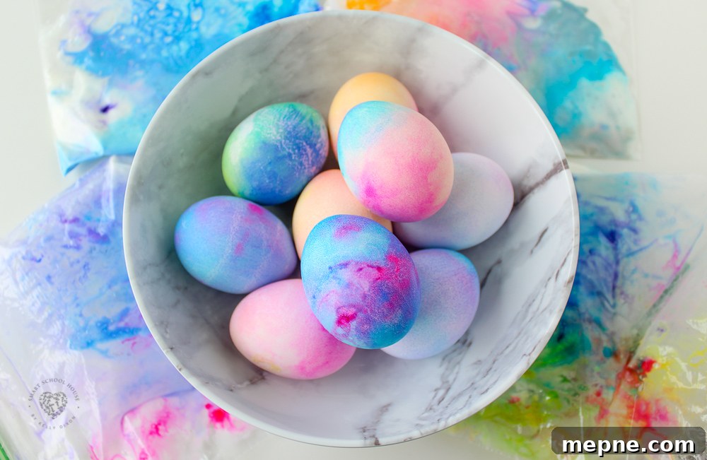 Whipped Cream Dyed Easter Eggs! Coloring Easter Eggs has never been easier! You only need two ingredients, whipped cream and food coloring!