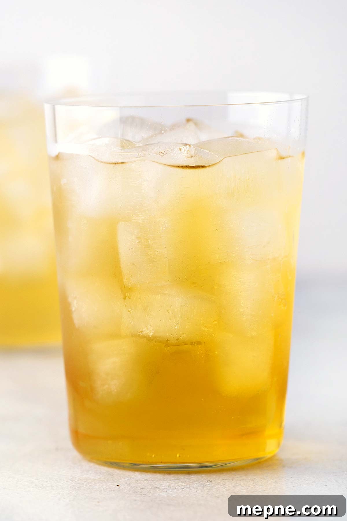 How to Make Iced Green Tea at Home 8 Iced Green Tea in clear glass.
