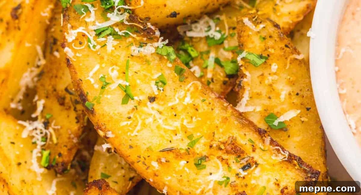 30 Side Dishes for French Dip Sandwiches 17 Up close image of oven baked potato wedges.