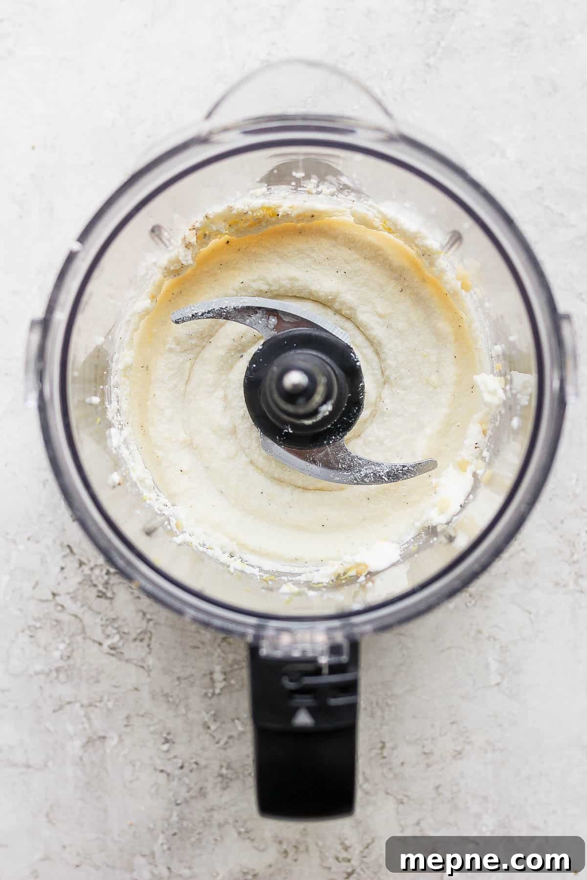 Honey Whipped Ricotta Spread for Toasts and Fruit 4 Whipped ricotta in a food processor.