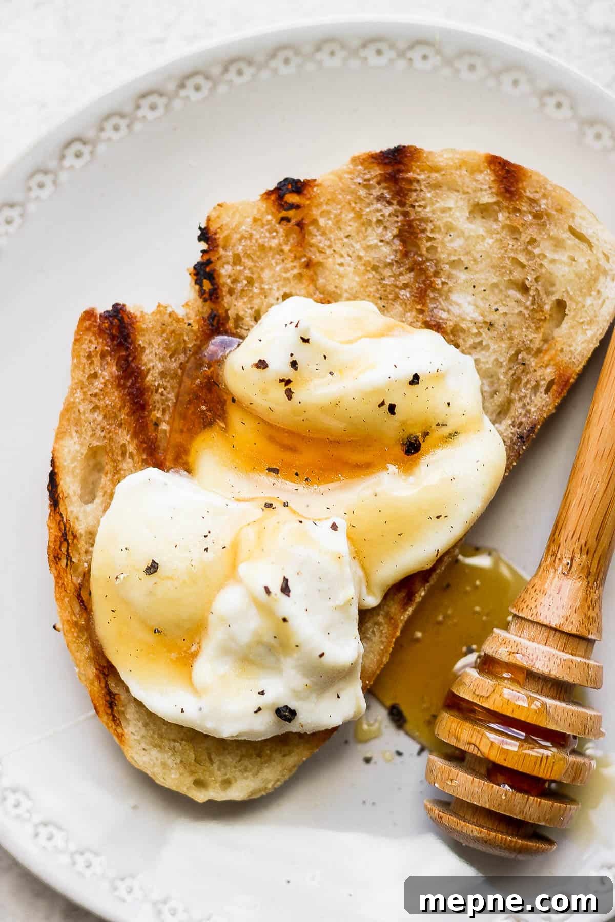 Honey Whipped Ricotta Spread for Toasts and Fruit 5 Whipped ricotta on grilled bread with added honey.