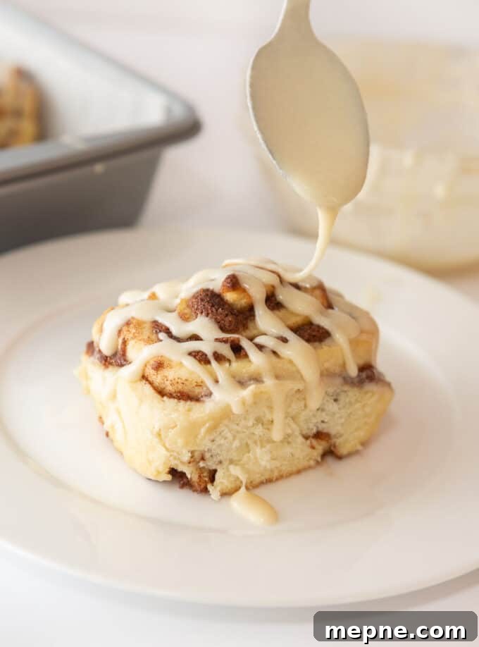 Homemade Cream Cheese Icing for Cinnamon Rolls 2 Cinnamon roll with vanilla glaze