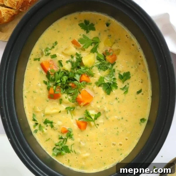Creamy Broccoli and Stilton Soup Recipe 8 Bit slow cooker pan full of creamy slow cooker vegetable soup.