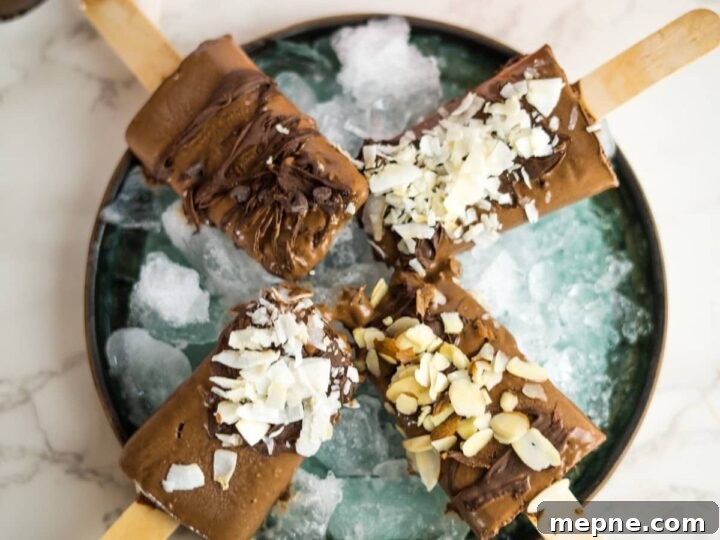 25 Low Carb Ice Cream Recipes for Creamy Keto Desserts 22 fudgesicles on a plate.