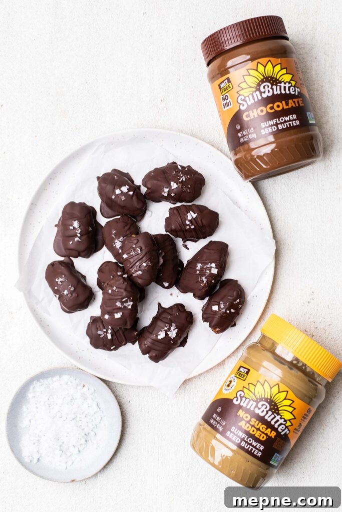 Chocolate-Stuffed Medjool Dates with Nut Butter 3 A plate of chocolate dates sitting next to two jars of SunButter.