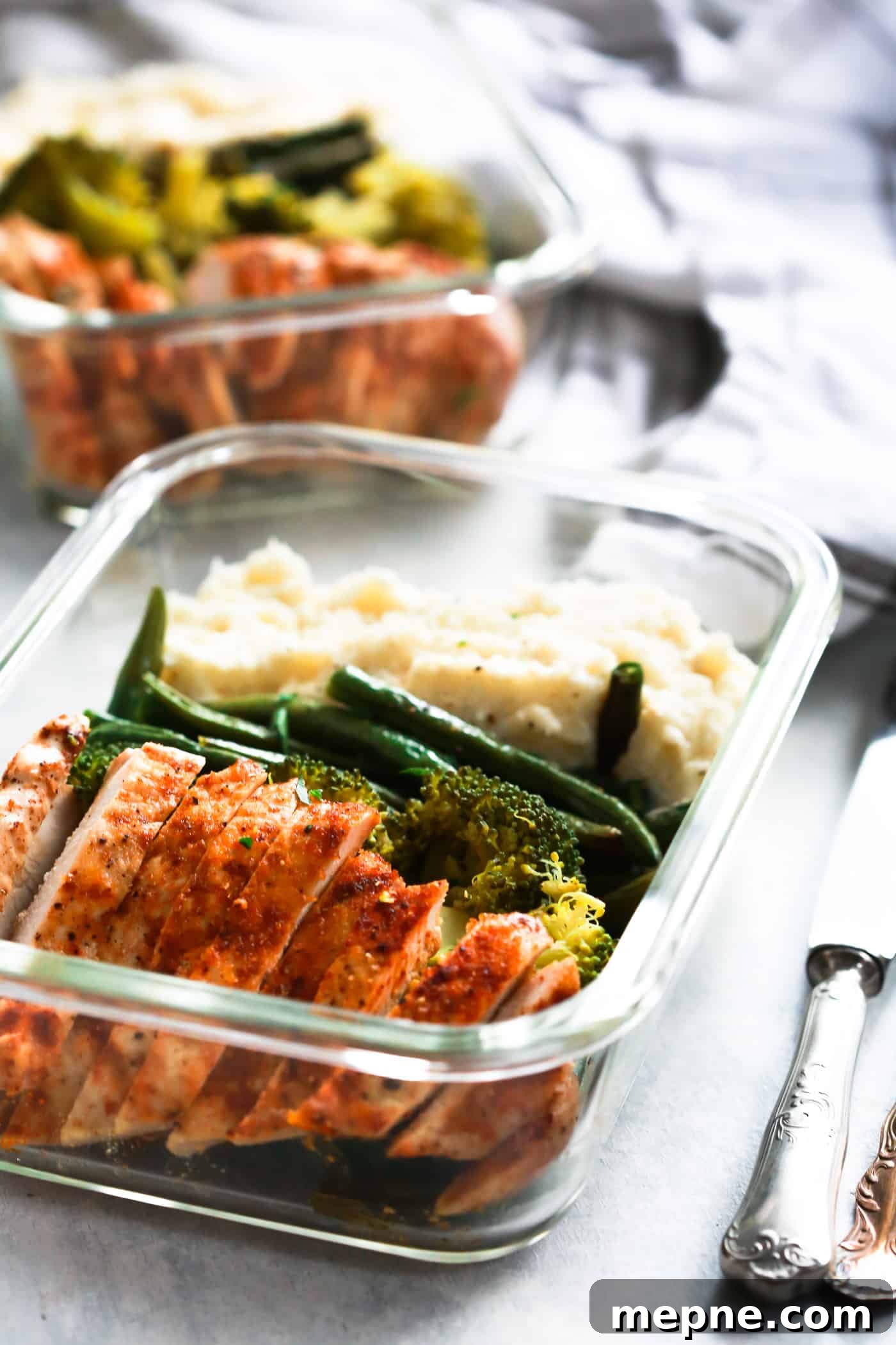 Keto Dinner Recipes: Low-Carb Ideas for Weeknights 14 close-up of spicy chicken and mashed cauliflower in a glass bowl