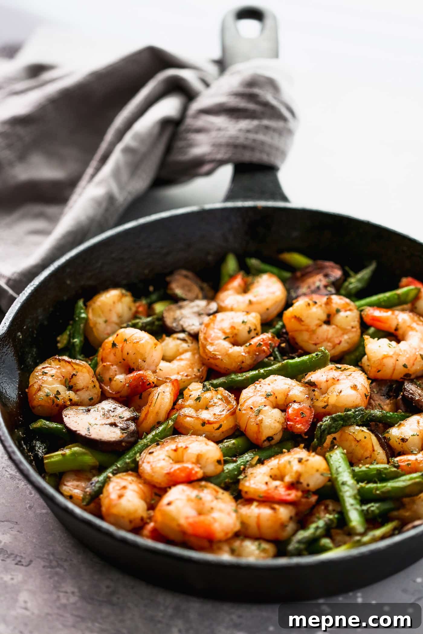 Keto Dinner Recipes: Low-Carb Ideas for Weeknights 28 shrimp and asparagus in a cast iron skillet