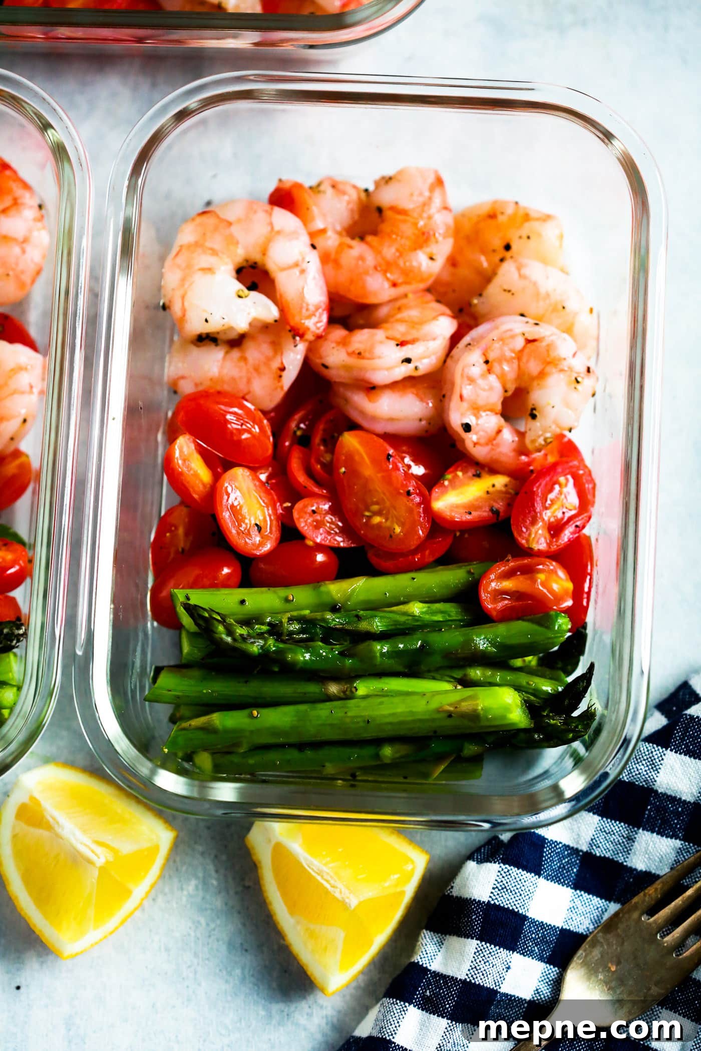Keto Dinner Recipes: Low-Carb Ideas for Weeknights 31 shrimp, asparagus and tomatoes in a glass bowl