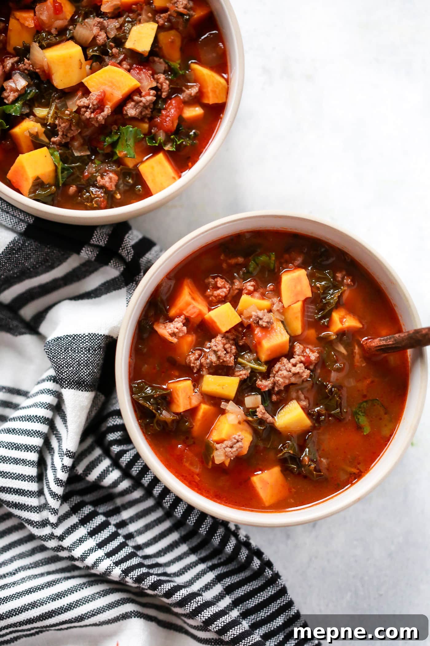 Keto Dinner Recipes: Low-Carb Ideas for Weeknights 32 overhead view of two bowls containing Ground Beef Butternut Squash Kale Soup