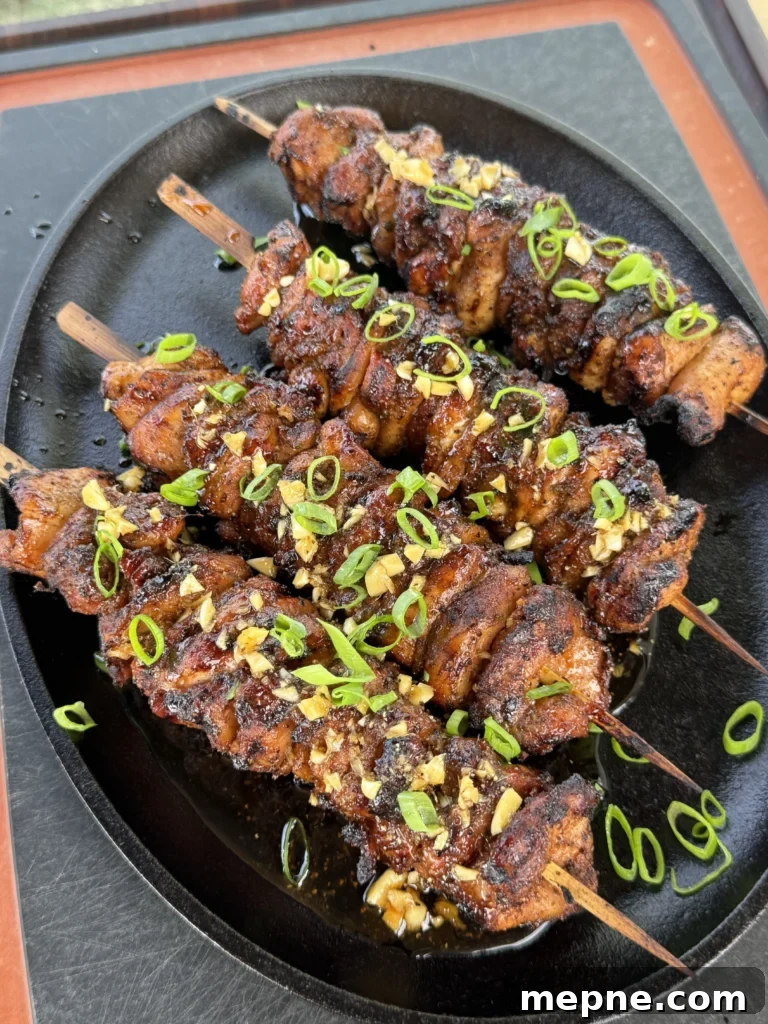 chicken skewers on a plate
