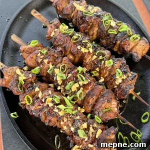 chicken skewers on a plate