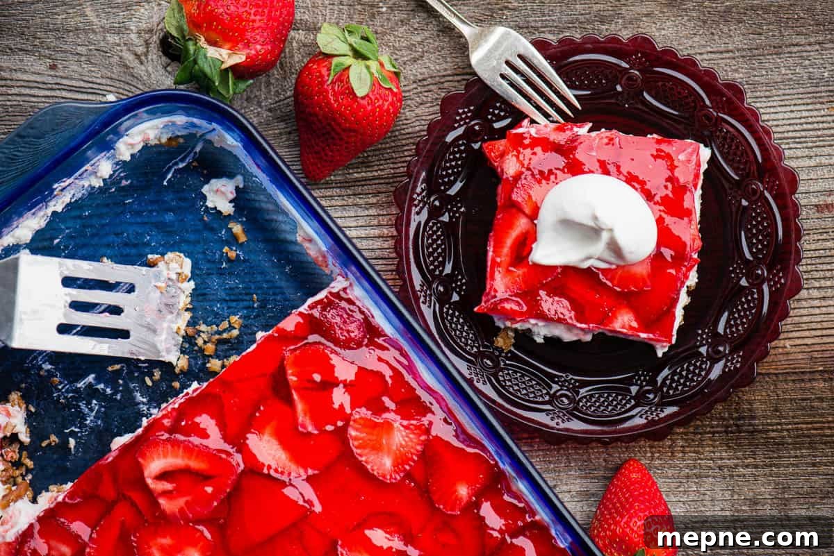 Top view of strawberry pretzel salad set in a baking dish.