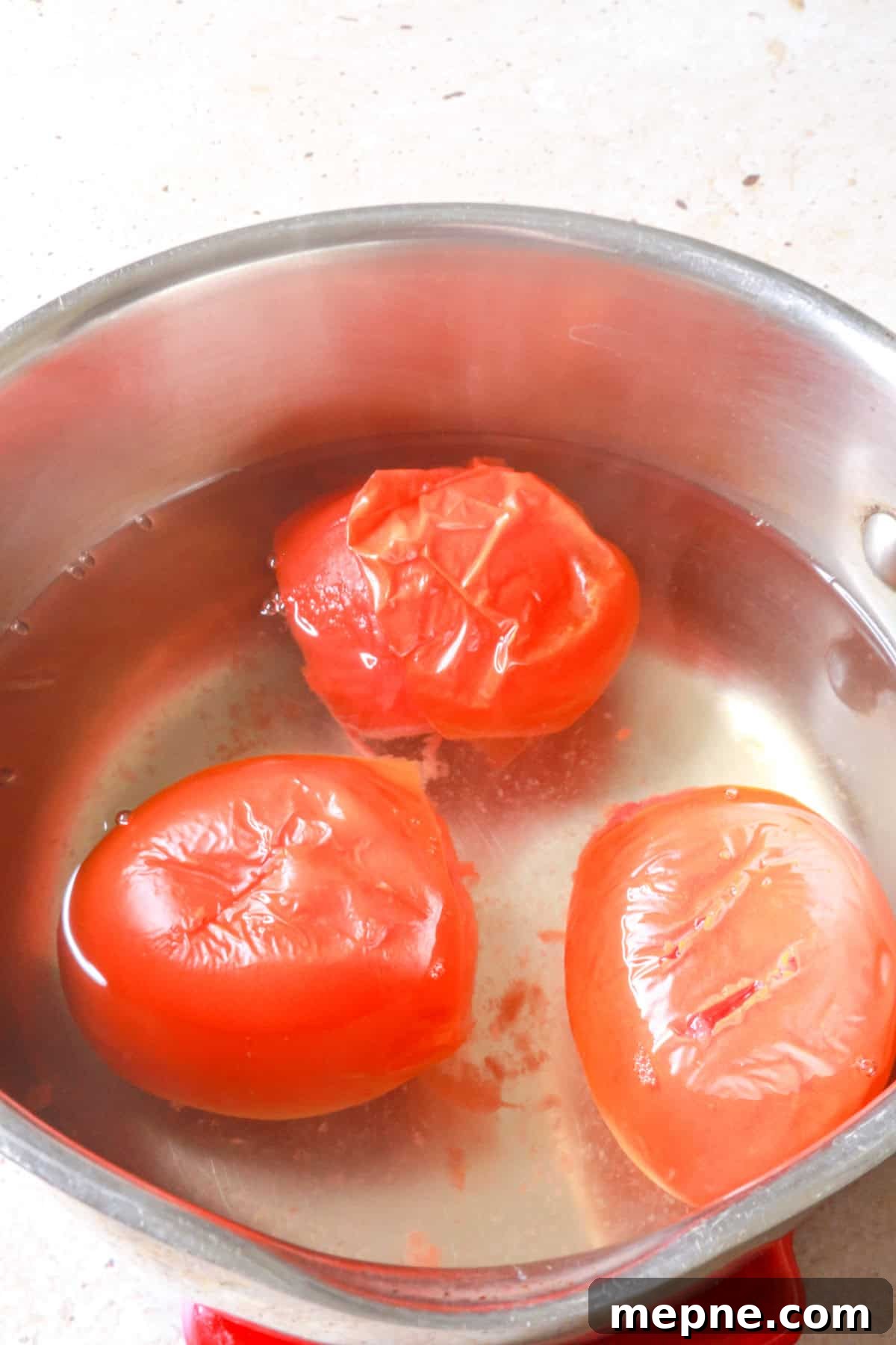 Boiling 3 tomatoes