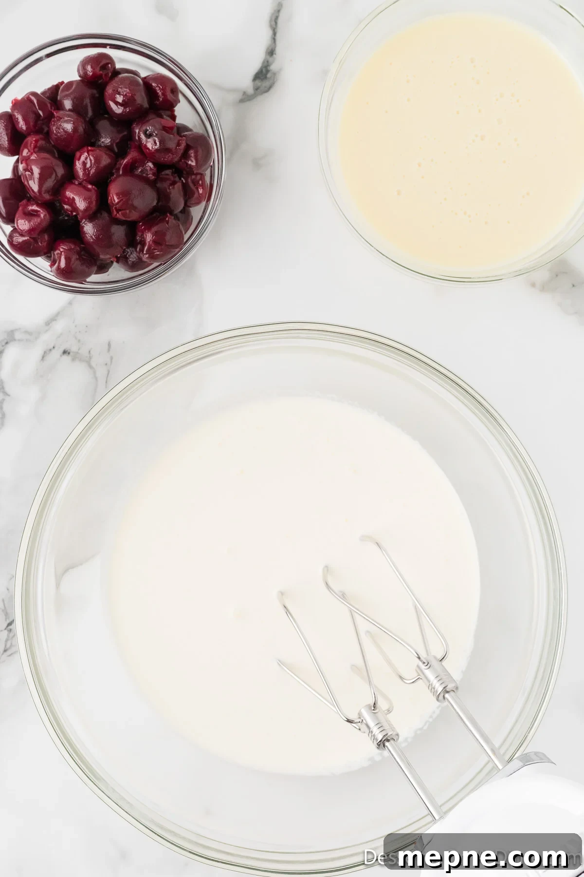 Homemade Cherry Chocolate Chip Ice Cream Recipe 4 Mixing bowl of heavy cream.