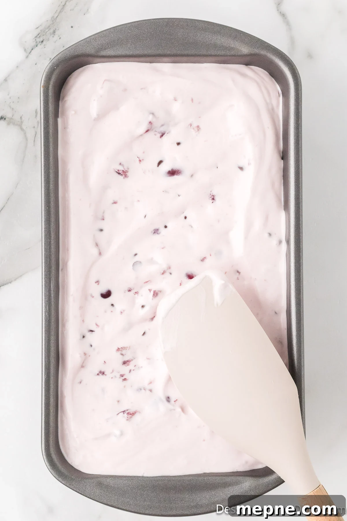 Homemade Cherry Chocolate Chip Ice Cream Recipe 8 Mixture spread into loaf pan.