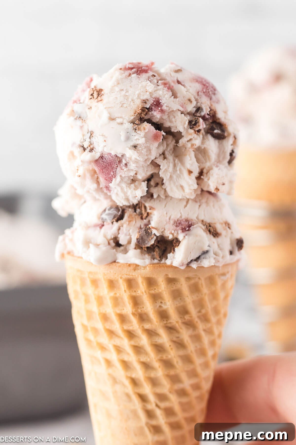 Homemade Cherry Chocolate Chip Ice Cream Recipe 10 Cone of cherry ice cream.