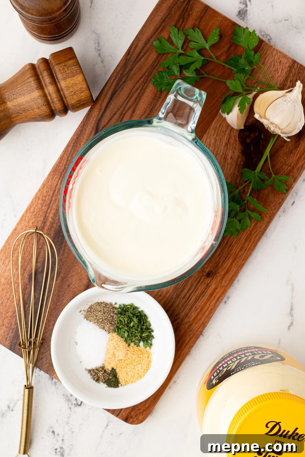 How to Make Creamy Buttermilk Ranch Dressing 4 whisking together spices, buttermilk and mayonnaise