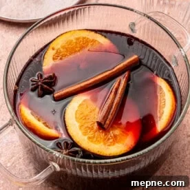 Cinnamon sticks and other spices have been added on top.