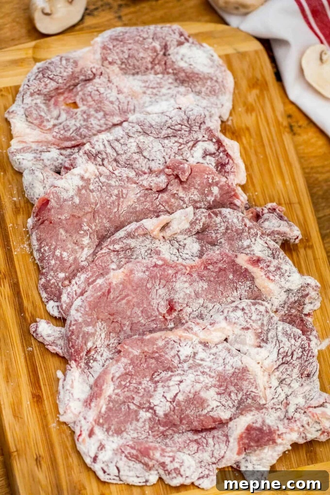 Tender Slow Cooker Swiss Steak Recipe 5 Flour coated round steaks.