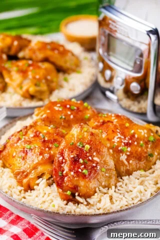 Juicy crockpot brown sugar garlic chicken served with rice.