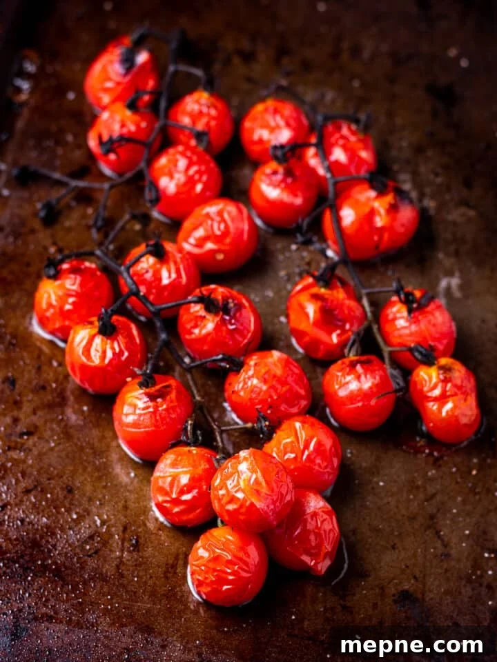Pesto Rigatoni with Burst Cherry Tomatoes and Burrata 6 roasted tomatoes on sheet pan