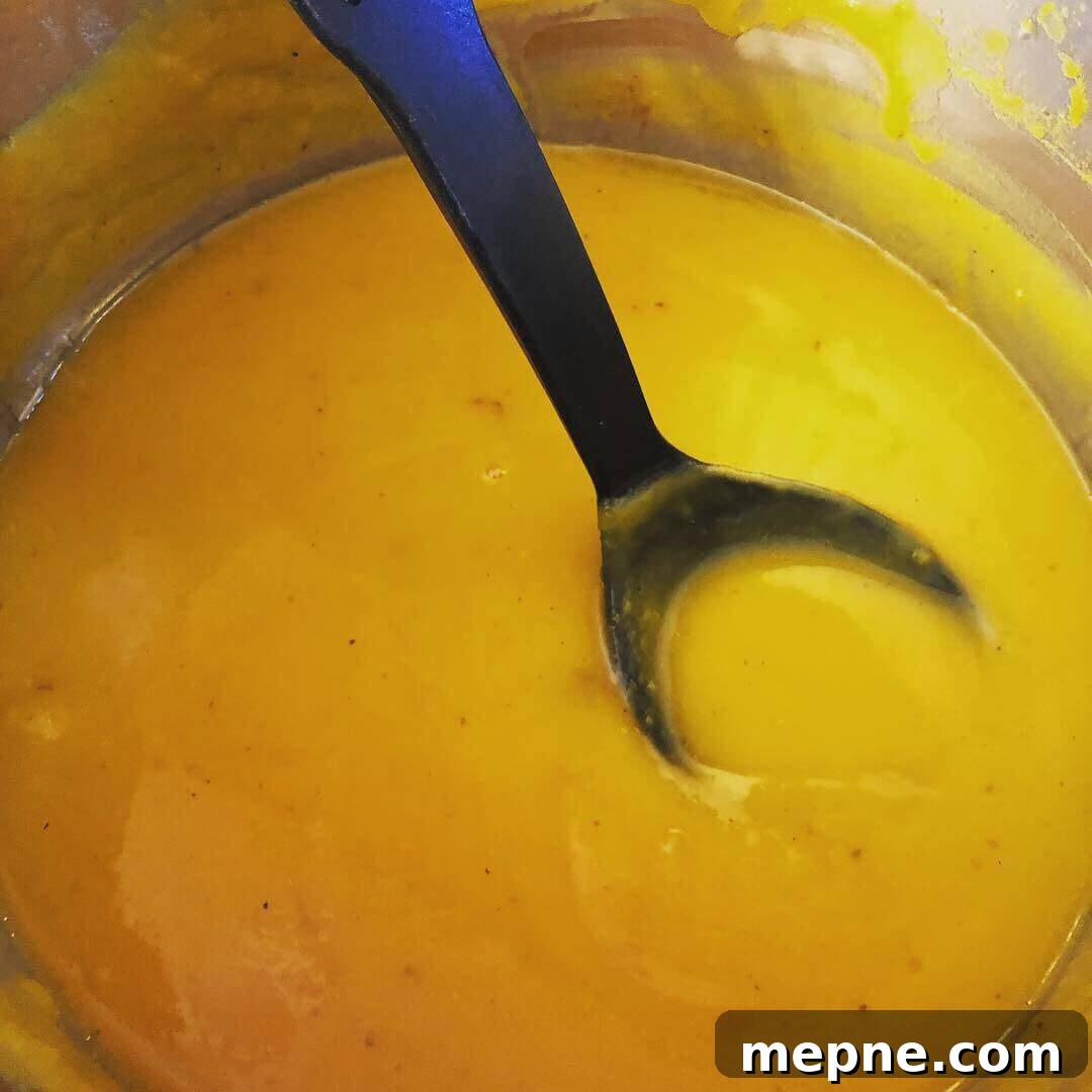 Creamy Instant Pot Butternut Squash Bisque Recipe 3 Butternut squash bisque in an Instant Pot bowl.