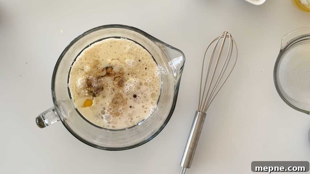 Fluffy Gluten-Free Oat Flour Pancake Recipe 5 All the pancake batter ingredients and a glass mixing bowl.