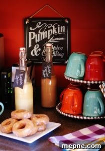Thanksgiving coffee station with mugs, fall creamer, and seasonal treats