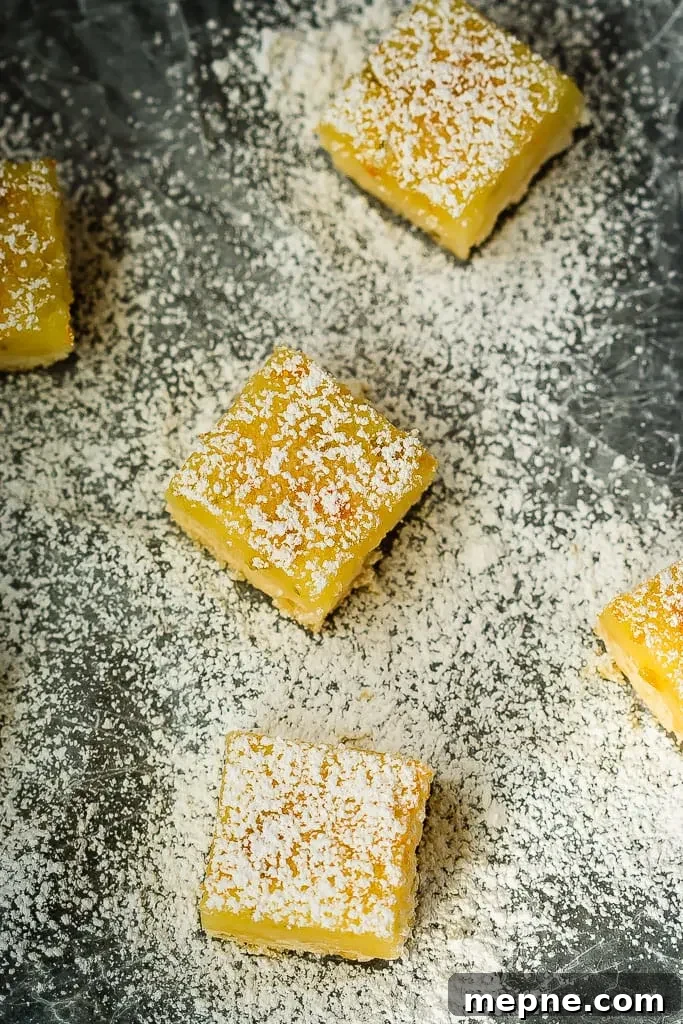 Lemon Lime Bars with Buttery Shortbread Crust 3 Lemon Lime Bars with powdered sugar and shortbread crust