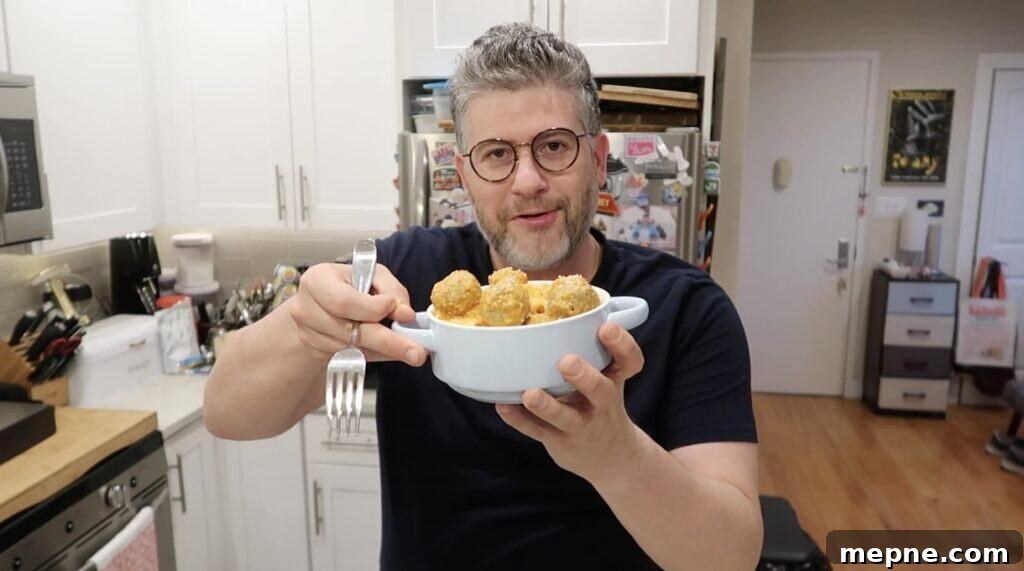 Instant Pot Meatballs with Marinara Pasta 16 Man holding bowl of pasta