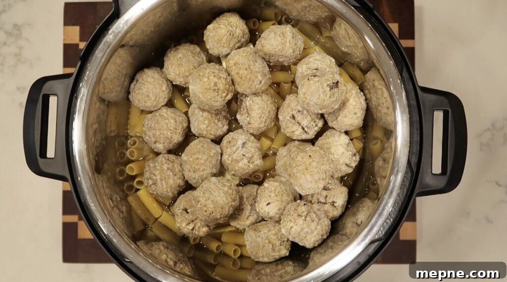 Instant Pot Meatballs with Marinara Pasta 7 Topping pasta with frozen meatballs