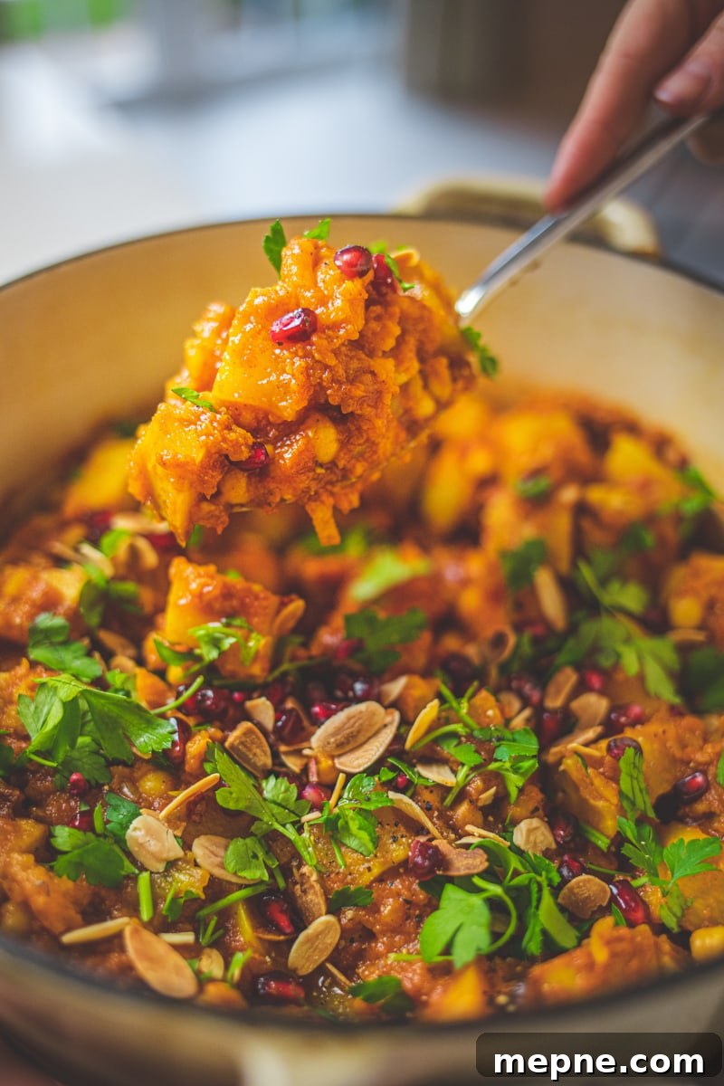 Vegan Root Vegetable Tagine with toasted almonds and pomegranate - Georgie Eats