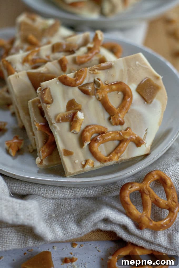 Homemade Cookie Butter White Chocolate Bark Recipe 5 cookie butter white chocolate bark on a plate