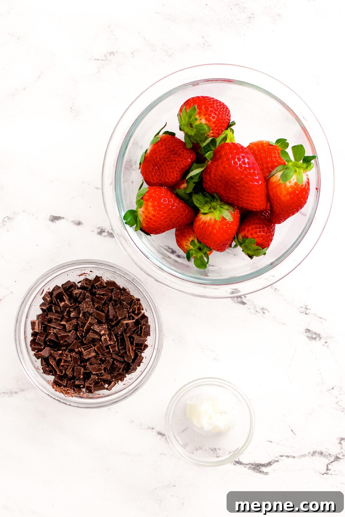 Overhead photo of ingredients to make chocolate covered strawberries.