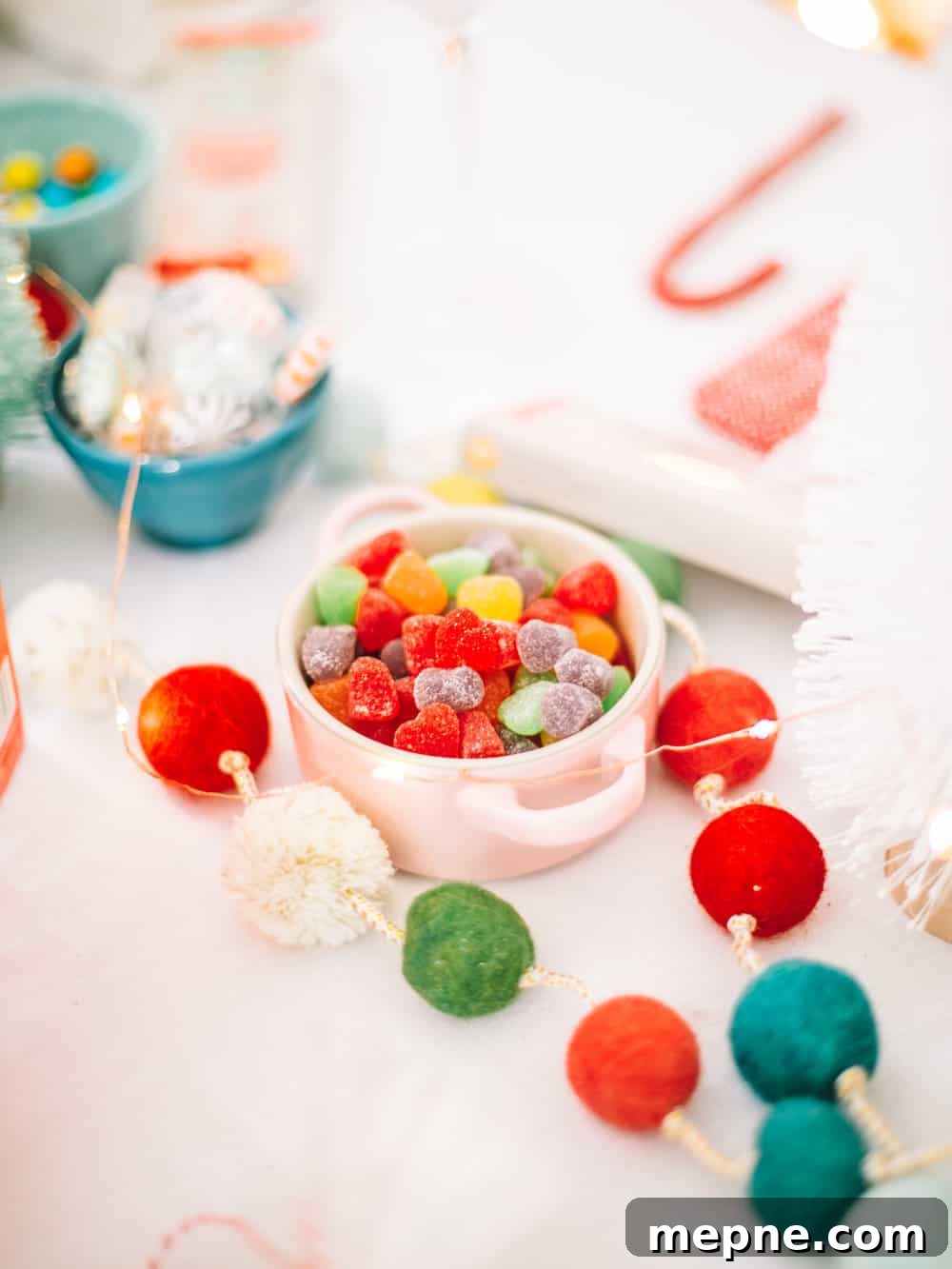 How to Host a Gingerbread House Decorating Party 3 Holiday gingerbread house decorating setup