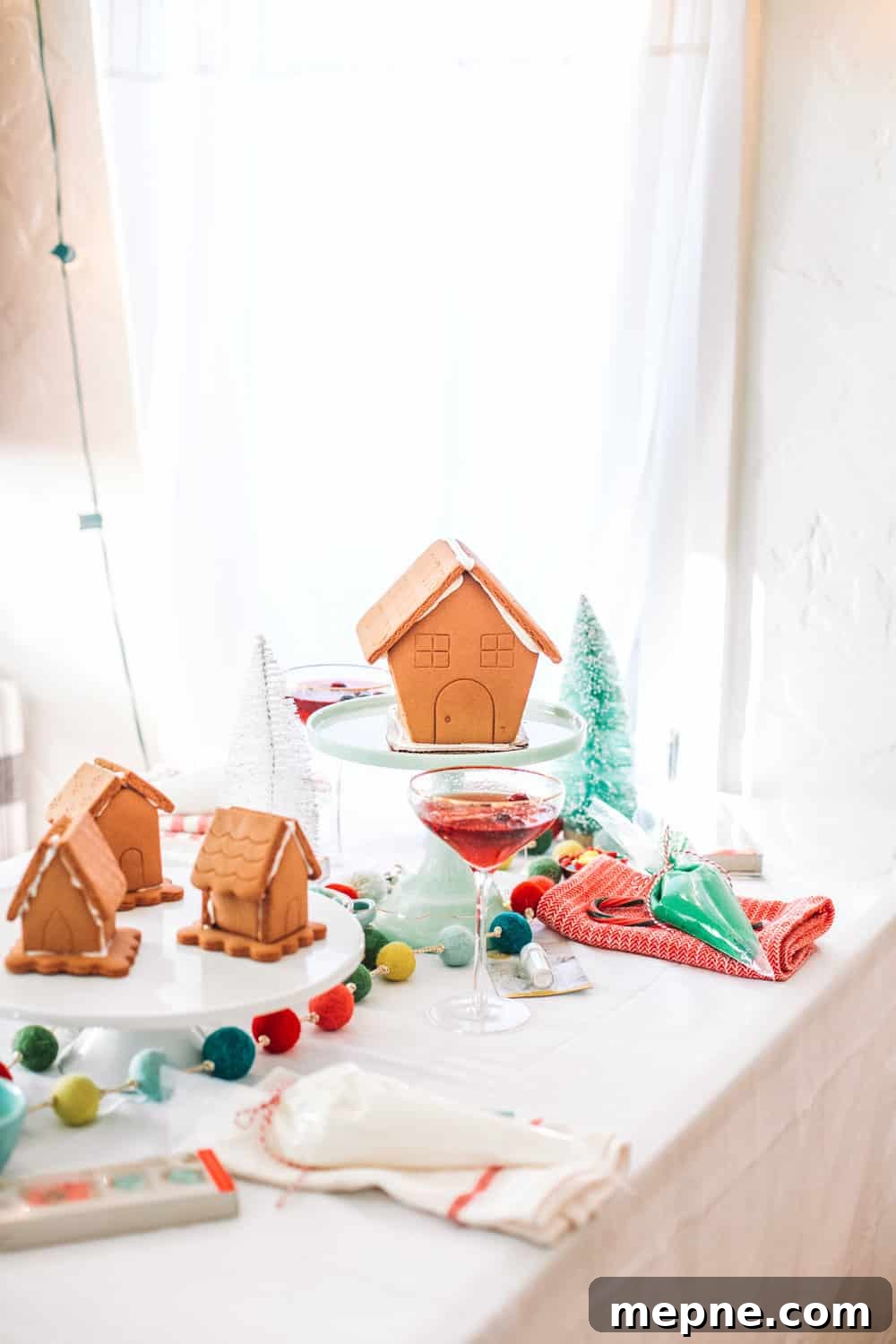 How to Host a Gingerbread House Decorating Party 7 Holiday party table with gingerbread house decorations