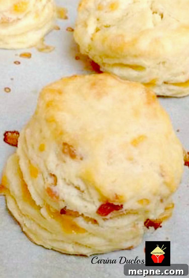 Freshly baked Cheesy Bacon Biscuits on a plate