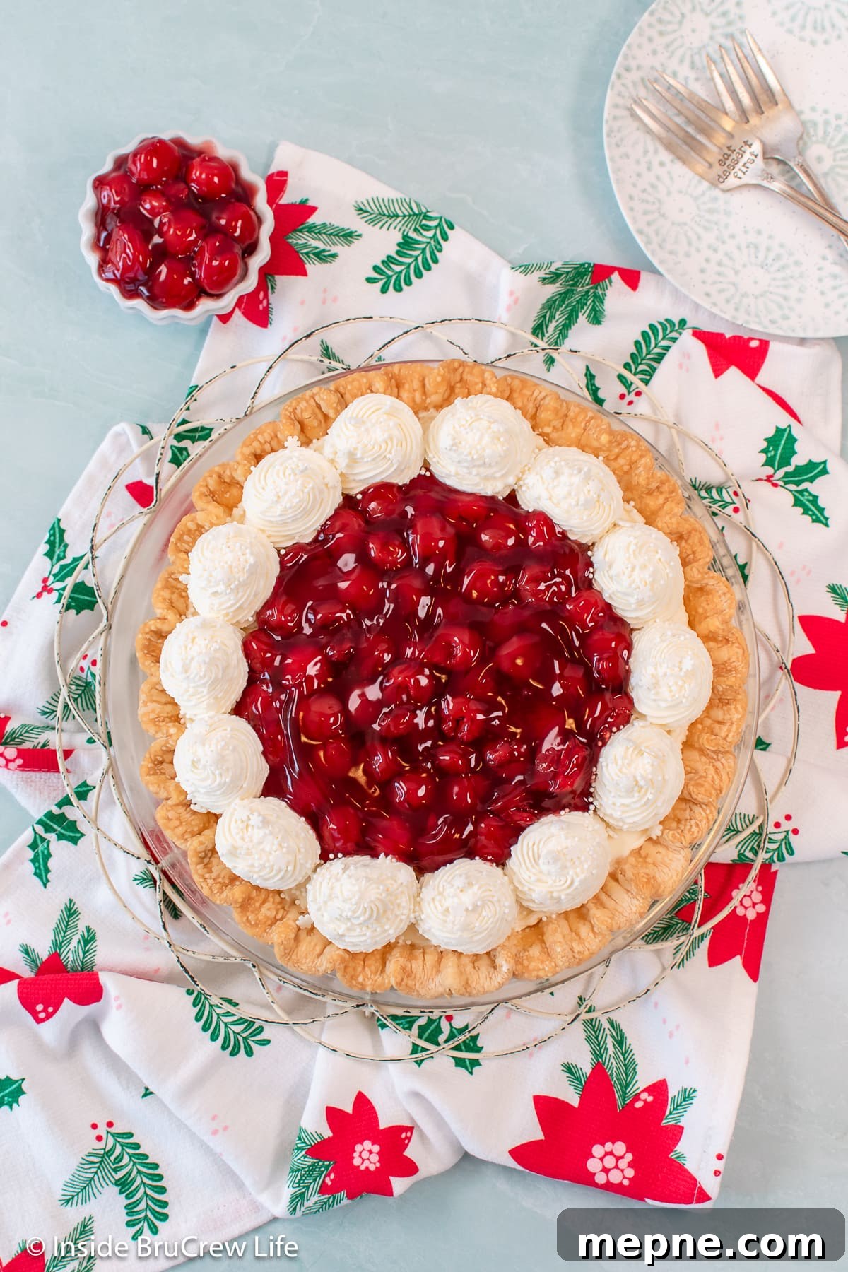 Cherry Pie with Cream Cheese Filling 5 On overhead picture of a decorated cherry cheese pie.