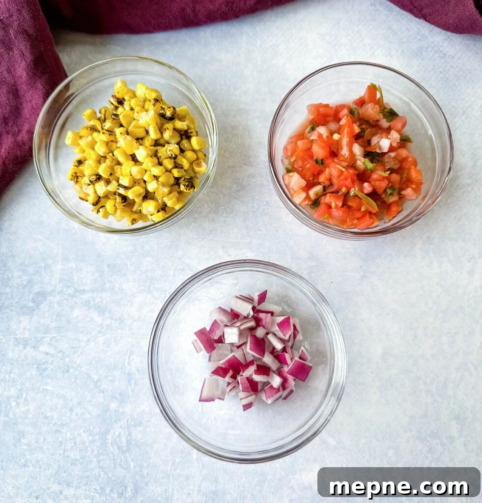 Shrimp Taco Salad with Creamy Lime Dressing 4 roasted corn, salsa, and chopped onions in separate glass bowls