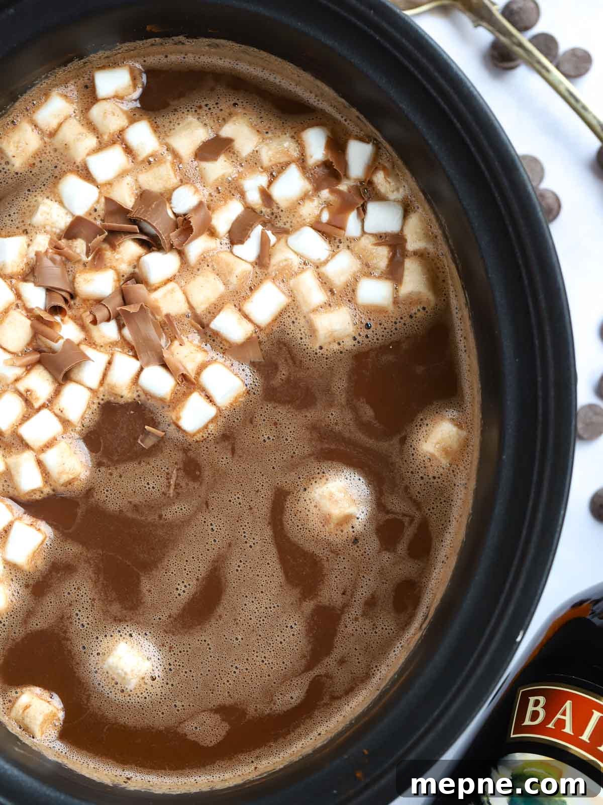 Slow Cooker Baileys Irish Cream Hot Chocolate Recipe 2 Baileys hot chocolate made in a slow cooker with cream and cocoa, with marshmallows on top.