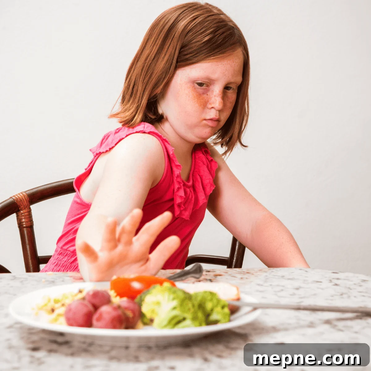 How to Introduce New Foods to Your Picky Eater 3 kid rejecting food