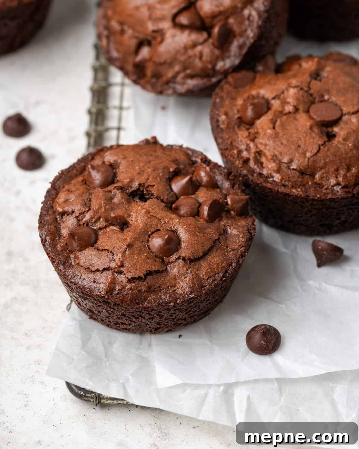 best gluten free brownies A small batch of brownies sitting on a cooling rack.