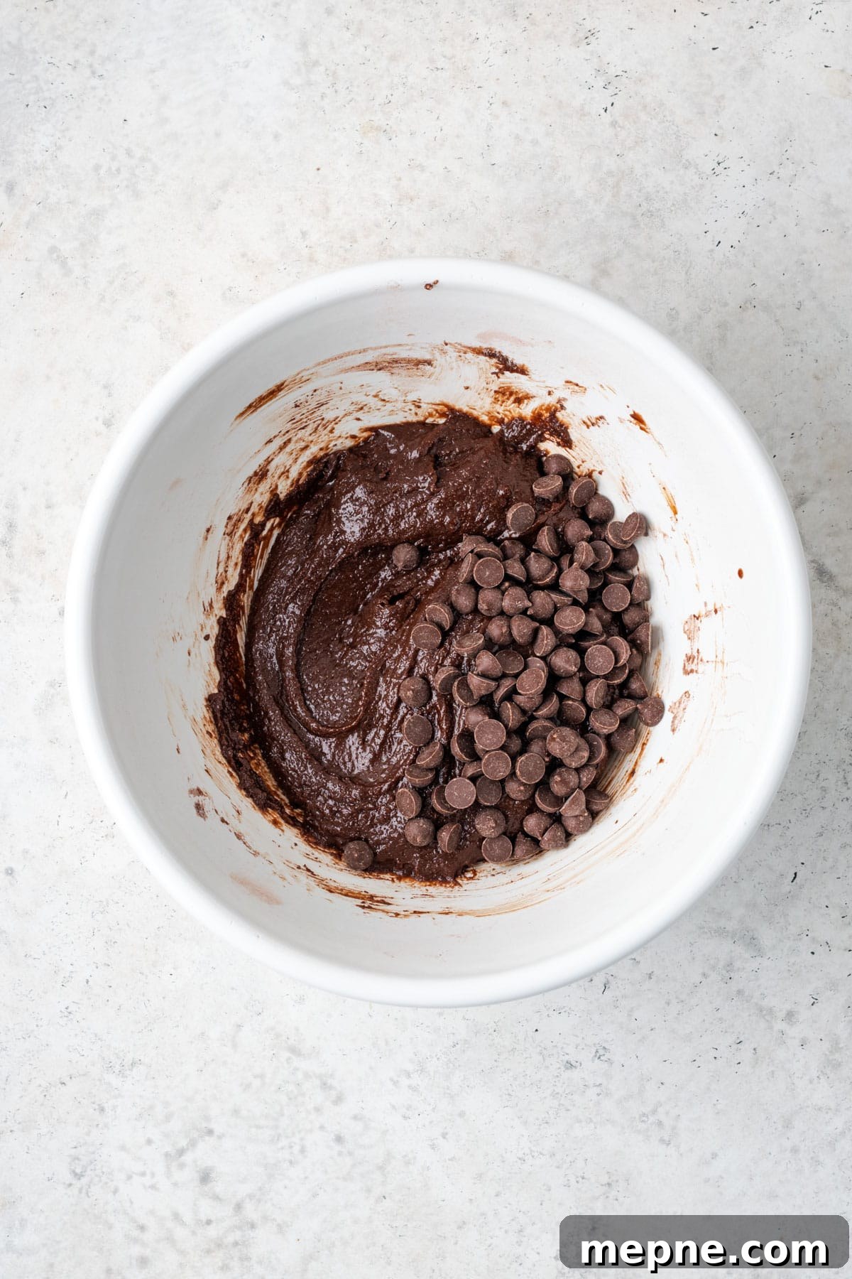 Fudgy Small-Batch Brownies Recipe 6 Chocolate chips added to the mixed brownie batter.