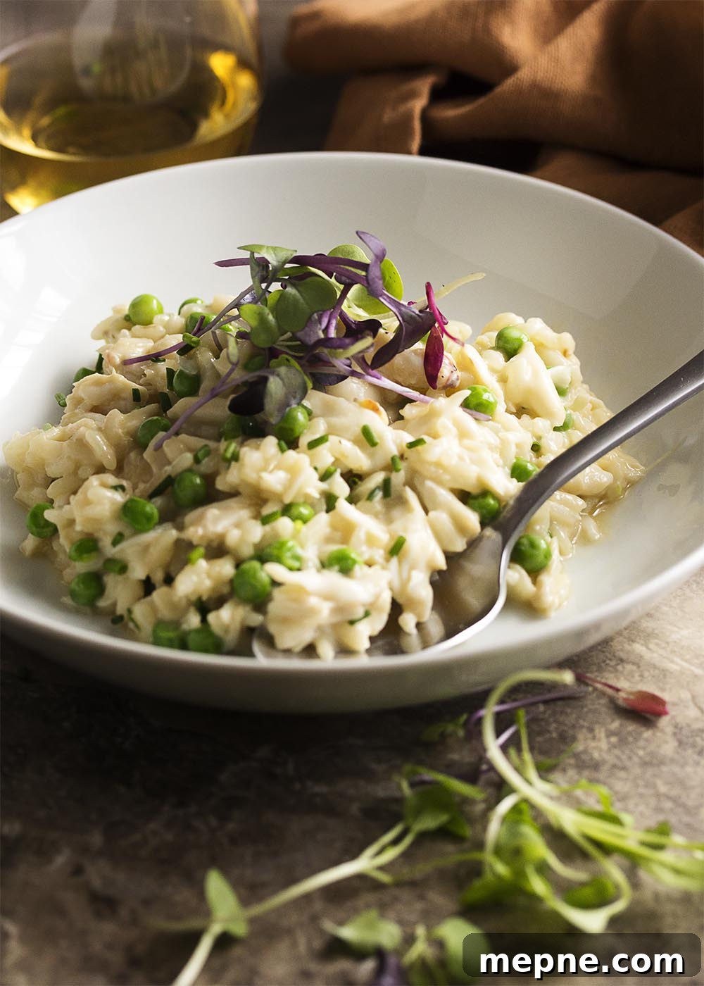 Creamy Crab Risotto with Mascarpone and Peas 2 Creamy crab risotto with mascarpone, lump crab meat, and baby peas served as an elegant one-pot dinner.