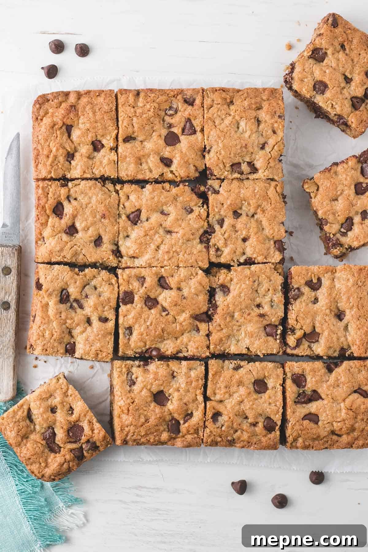 Chewy Gluten-Free Oatmeal Chocolate Chip Cookie Bars 2 A batch of Gluten-free Oatmeal Chocolate Chip Bars cut into squares.